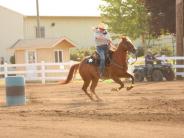 Showing some fast riding skills barrel racing