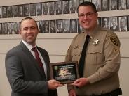 Sheriff Garton Presents Lifesaving Award to Eric Larson
