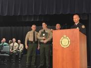Deputy Hatch accepting his certificate